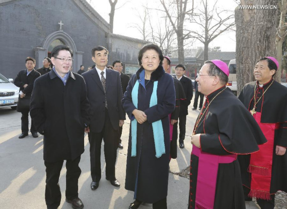 Chinese Vice Premier Liu Yandong (C) visits the Chinese Catholic Patriotic Association and the Bishops' Conference of Catholic Church in China during an inspection tour on the regulation of religious affairs, in Beijing, China, Feb. 13, 2015. (Xinhua/Ding Lin)