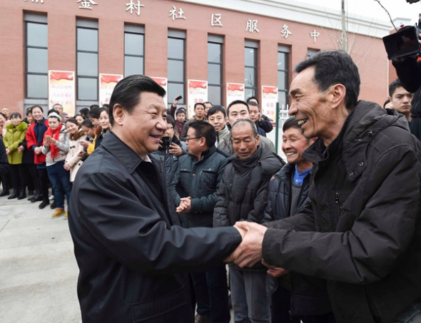 Chinese President Xi Jinping meets with villagers in Zhaojin county in Tongchuan city in Northwest China's Shaanxi province on Feb 14, 2015. The revolutionary base was founded in Zhaojin County in 1933. [Photo: Xinhua Insight]