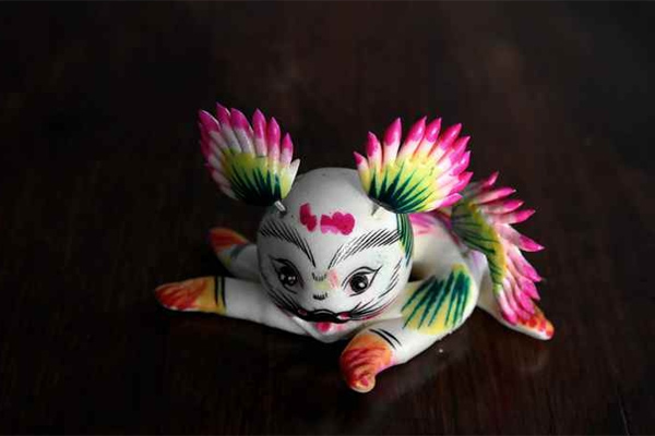 Photo shows a rat-shaped huamo. (people.cn)