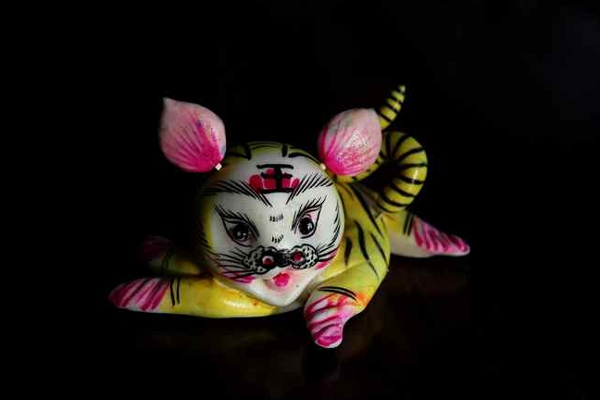 Photo shows a tiger-shaped huamo. (people.cn)