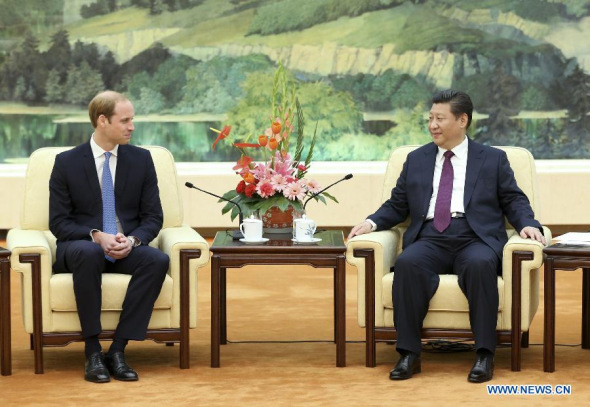 Chinese President Xi Jinping (R) meets with Britain's Prince William at the Great Hall of the People in Beijing, capital of China, March 2, 2015. (Xinhua/Ma Zhancheng)