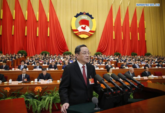 Yu Zhengsheng, chairman of the National Committee of the Chinese People's Political Consultative Conference (CPPCC), delivers a report on the work of the CPPCC National Committee's Standing Committee at the third session of the 12th CPPCC National Committee at the Great Hall of the People in Beijing, capital of China, March 3, 2015. (Xinhua/Ju Peng)