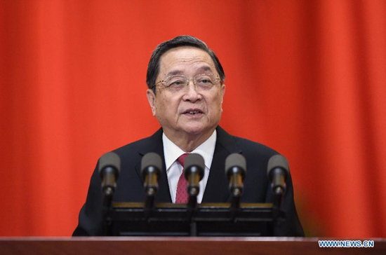 Yu Zhengsheng, chairman of the National Committee of the Chinese People's Political Consultative Conference (CPPCC), delivers a report on the work of the CPPCC National Committee's Standing Committee at the third session of the 12th CPPCC National Committee at the Great Hall of the People in Beijing, capital of China, March 3, 2015. The third session of the 12th National Committee of the CPPCC opened in Beijing on March 3. (Xinhua/Rao Aimin)