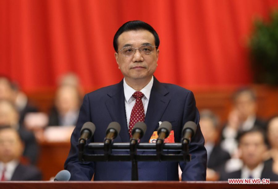 Chinese Premier Li Keqiang delivers the government work report during the opening meeting of the third session of China's 12th National People's Congress (NPC) at the Great Hall of the People in Beijing, capital of China, March 5, 2015. (Xinhua/Huang Jingwen)