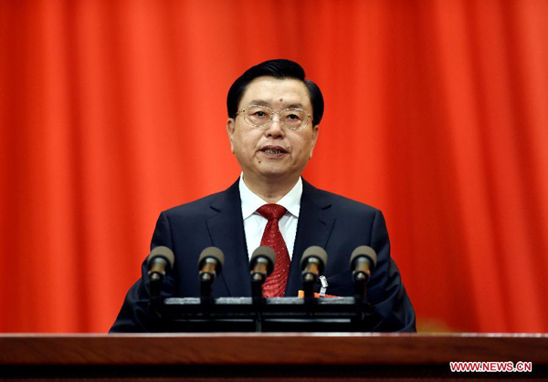 Zhang Dejiang, chairman of the Standing Committee of China's National People's Congress (NPC), delivers a work report of the NPC Standing Committee during the second plenary meeting of the third session of the 12th NPC at the Great Hall of the People in Beijing, capital of China, March 8, 2015. (Xinhua/Xie Huanchi)