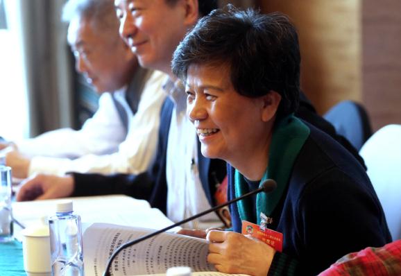 Xu Lin, a member of the CPPCC National Committee and director-general of the Confucius Institute headquarters, or HanbanChina's overseas Chinese-language teaching programtakes part in group discussion of the Government Work Report in Beijing last week. (Photo: China Daily/Zou Hong)