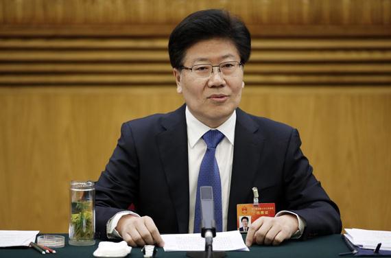 Zhang Chunxian, Party chief of Xinjiang Uygur autonomous region, attends a plenary meeting of Xinjiang legislators to the 12th National People's Congress, on March 10, 2015. (Photo/Chinanews.com)