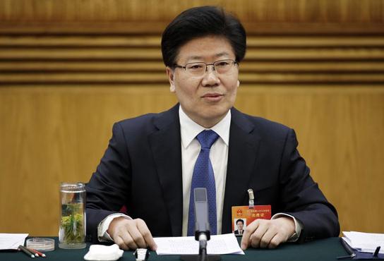 Zhang Chunxian, Party chief of Xinjiang Uygur autonomous region, attends a plenary meeting of Xinjiang legislators to the 12th National People's Congress, on March 10, 2015. (Photo/Chinanews.com)