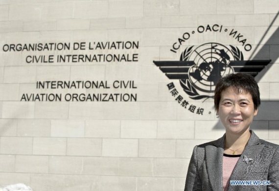 Liu Fang poses for photos outside the building of the International Civil Aviation Organization (ICAO) in Montreal, Canada, March 11, 2015. (Xinhua/Andrew Soong)