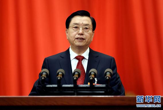 China's top legislator Zhang Dejiang delivers a work report at a a plenary meeting of the National People's Congress' annual session in Beijing, March 8, 2014. (Photo/Xinhua) 