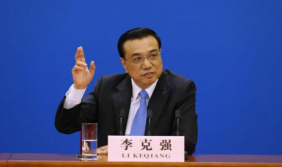 Chinese Premier Li Keqiang speaks at a news conference after the closing session of the 12th National People's Congress (NPC), at the Great Hall of the People, in Beijing, March 15, 2015.(Photo/Xinhua)  