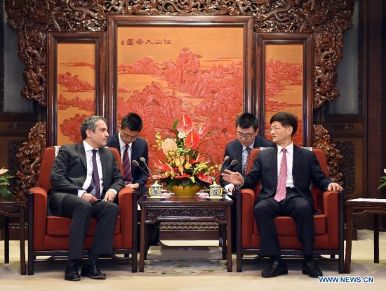 Meng Jianzhu (R), head of the Commission for Political and Legal Affairs of the Communist Party of China (CPC) Central Committee, meets with Umit Yalcin, deputy under-secretary of the Foreign Ministry of Turkey, in Beijing, capital of China, March. 16, 2015. (Xinhua/Zhang Duo)