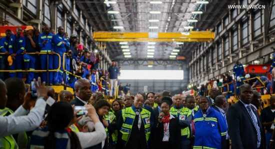 outh African President Jacob Zuma (C) visits the Transnet Engineering Koedoespoort Plant in Pretoria, South Africa, on March 19, 2015. Ninety-five Chinese-made electric locomotives were delivered to South Africa on Thursday at a grand ceremony attended by South African President Jacob Zuma. (Xinhua/Zhai Jianlan)