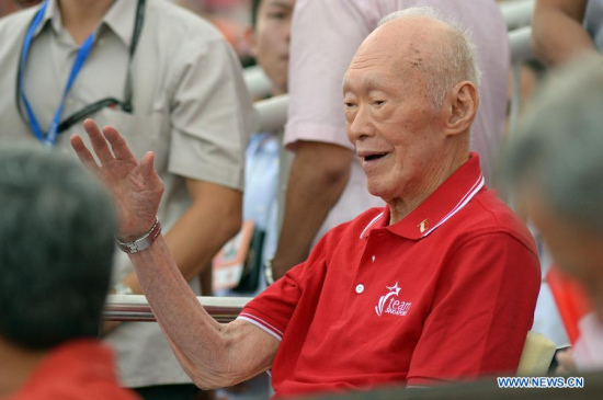 File photo taken on Aug. 9, 2014 shows Lee Kuan Yew greeting the audience during the 49th National Day Parade in Singapore. Singapore's former Prime Minister Lee Kuan Yew died at 3:18 a.m. local time at age of 91 in Singapore, March 23, 2015. (Xinhua/Then Chih Wey)
