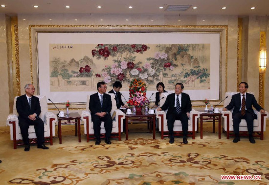Yu Zhengsheng (2nd R), chairman of the National Committee of the Chinese People's Political Consultative Conference, meets with a Japanese ruling parties delegation led by Sadakazu Tanigaki, secretary general of the Liberal Democratic Party, and Yoshihisa Inoue, secretary general of the Komei Party, in Beijing, capital of China, March 23, 2015. (Xinhua/Liu Weibing)