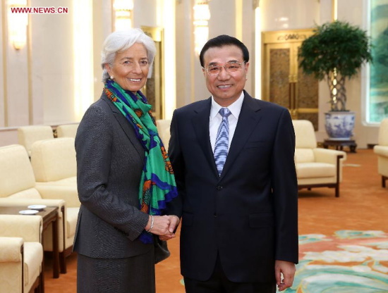 Chinese Premier Li Keqiang (R) meets with Christine Lagarde, managing director of the International Monetary Fund (IMF), in Beijing, capital of China, March 23, 2015. (Xinhua/Pang Xinglei)