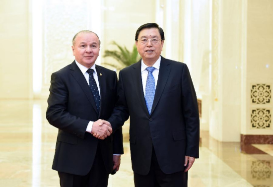 Zhang Dejiang (R), chairman of the Standing Committee of the National People's Congress (NPC), holds talks with Elias Castillo, president of the Latin American Parliament, in Beijing, China, March 23, 2015. (Xinhua/Zhang Duo)