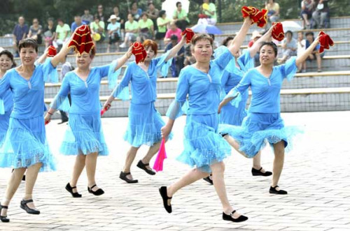 Public dancing is a consequence of China's rapidly aging society, observers say. (Photo: Zou Hong/China Daily)