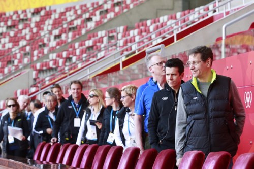 International Evaluation Commission Chairman Alexander Zhukov (right) and colleagues inspect facilities at National Stadium in Beijing on Tuesday. (Photo: Feng Yongbin/China Daily)  