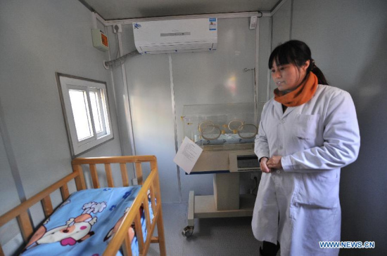 Photo taken on Dec. 11, 2013 shows the interior of the baby hatch in Nanjing, capital of east China's Jiangsu Province. The first baby hatch of Nanjing City was set up and put into use near Nanjing Children Welfare Center recently. The haven received an abandoned infant on Dec. 10. (Xinhua/Shen Peng)