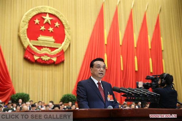 Chinese Premier Li Keqiang delivers the government work report during the opening meeting of the third session of China's 12th National People's Congress (NPC) at the Great Hall of the People in Beijing, capital of China, March 5, 2015. (Xinhua/Pang Xinglei)