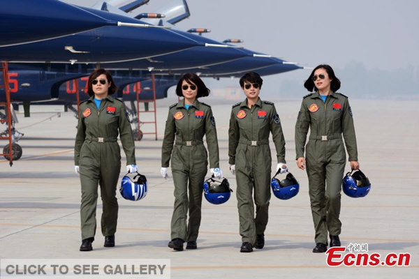 An undated file photo shows that four Chinese female J-10 pilots return from their training. The Bayi (August 1st) Aerobatic Team has sent seven J-10s and female pilots to attend the 13th edition of the Langkawi International Maritime Aerospace Exhibition (LIMA Exhibition) in Langkawi, Malaysia. This is the first time that China's J-10s perform overseas, according to?Shen Jinke, a spokesperson of China's Air Force.(Photo: China News Service/Zhang Pengyan)