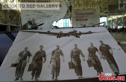 More than 100 precious historic photos taken by US forces during the WWII were displayed at the exhibition. Photos of more than 12 meters high and the P-40s used by the Flying Tigers were especially impressive to visitors. (Photo: China News Service/Mao Jianjun)