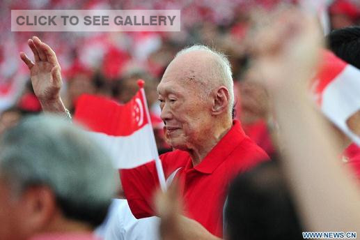 File photo taken on Aug. 9, 2013 shows Lee Kuan Yew attending the National Day Parade at the Float Marina Bay in Singapore. Singapore's former Prime Minister Lee Kuan Yew died at 3:18 a.m. local time at age of 91 in Singapore, March 23, 2015. (Photo: Xinhua/Then Chih Wey)