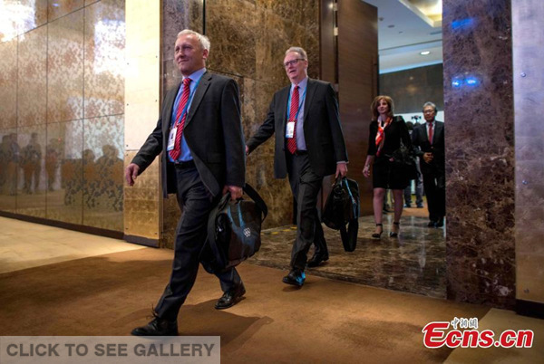Members of the IOC 2022 Evaluation Commission arrive to attend the opening ceremony of the inspection tour of Beijing, which has joined up with Zhangjiakou city in Hebei province to bid to co-host the 2022 Winter Olympics, March 24, 2015. (Photo provided to China News Service)