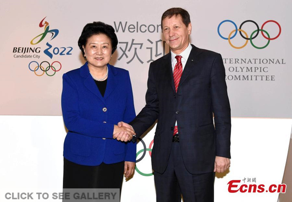 Chinese vice premier Liu Yandong shakes hands with Alexander Zhukov (R), chairman of the IOC evaluation commission and Russian IOC member, at the opening ceremony of the inspection tour of Beijing, which has joined up with Zhangjiakou city in Hebei province to bid to co-host the 2022 Winter Olympics, March 24, 2015. (Photo provided to China News Service)
