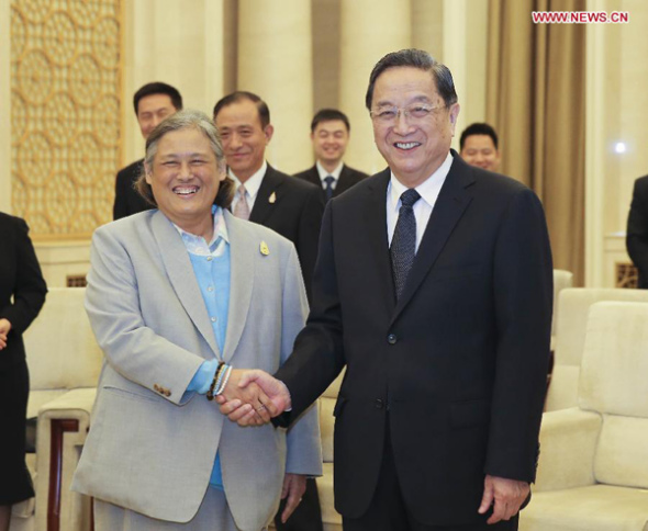 Yu Zhengsheng (R), chairman of the National Committee of the Chinese People's Political Consultative Conference, meets with visiting Thai Princess Maha Chakri Sirindhorn in Beijing, capital of China, April 3, 2015. (Xinhua/Ding Lin)