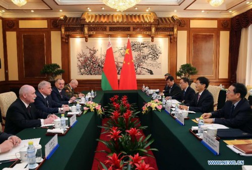 Meng Jianzhu (2nd R), head of the Commission for Political and Legal Affairs of the Communist Party of China (CPC) Central Committee, holds talks with Belarus' Security Council Secretary Alexander Mezhuev in Beijing, capital of China, April 7, 2015. (Xinhua/Liu Weibing)