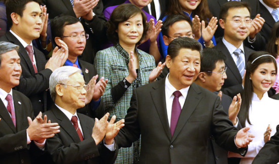 Xi Jinping, general secretary of the Communist Party of China Central Committee, and Vietnam's Communist Party chief Nguyen Phu Trong address young people from both countries in Beijing on Tuesday. (Photo: Wu Zhiyi/China Daily)  