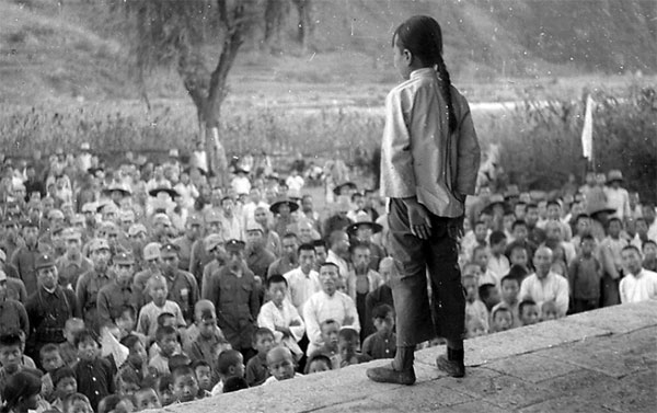 The head of the Children Resistance Regiment attends a public gathering in Pingxi, 1939.