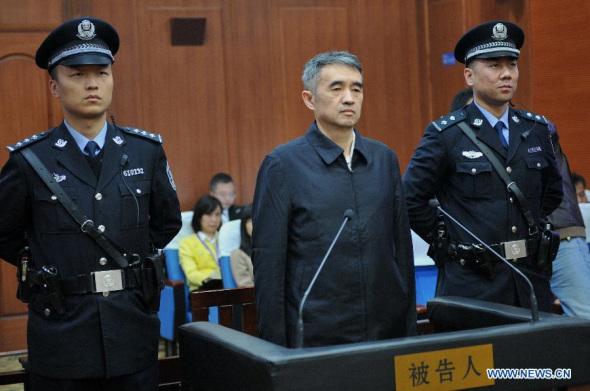 Liao Shaohua, a former provincial-level official in southwest China's Guizhou Province, stands trial at the Intermediate People's Court, in Xi'an, capital of northwest China's Shaanxi Province, April 9, 2015. Liao was sentenced to 16 years in prison for bribery and abuse of power on Thursday. (Xinhua)