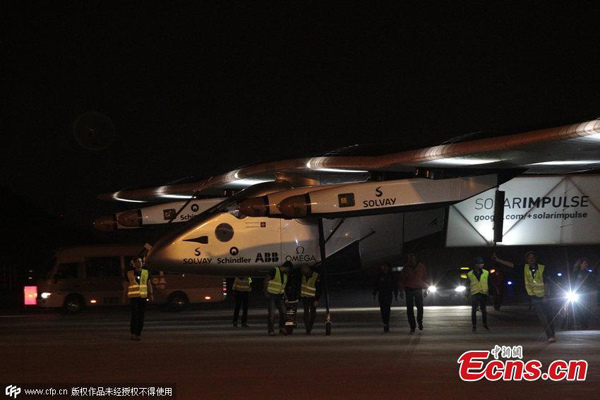 The Solar Impulse 2, the world's largest solar-powered aircraft touches down in Southwest China’s Chongqing municipality in the morning of Tuesday, March 31. It had left Mandalay in Myanmar some 20 hours previously. (Photo/CFP)