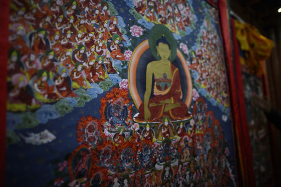 Thangka are paintings on cotton or silk appliqu. Photo by Ren Qi /chinadaily.com.cn