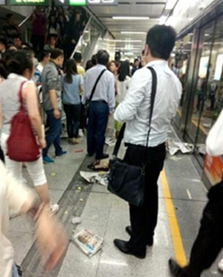 Twelve people were injured in a panic-driven stampede in a subway station in Shenzhen, south China's Guangdong Province, this morning, the citys Metro operator said.