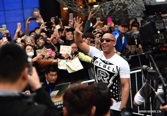 Movie star Vin Diesel attends a press conference for his new Fast & Furious movie Furious 7 in Beijing, capital of China, March 26, 2015. The movie will hit Chinese mainland screen on April 12. (Xinhua/Jin Liangkuai)