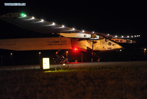 Swiss-made solar-powered plane Solar Impluse 2 arrives at Nanjing Lukou International Airport in Nanjing, capital of east China's Jiangsu Province, April 21, 2015.