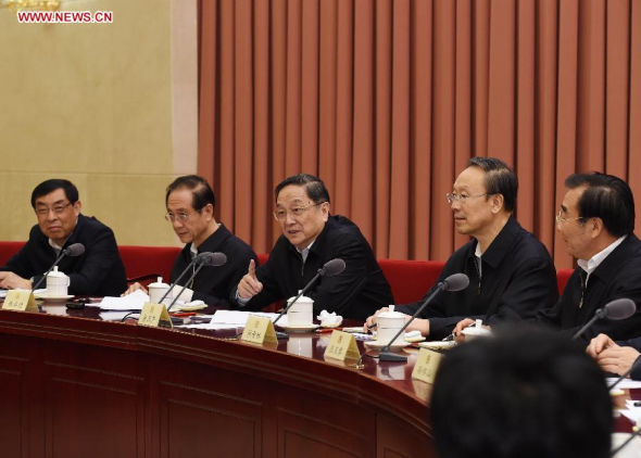 Yu Zhengsheng (C), chairman of the National Committee of the Chinese People's Political Consultative Conference (CPPCC), presides over a bi-weekly consultation session on air pollution in the Beijing-Tianjin-Hebei region, in Beijing, China, April 22, 2015. (Xinhua/Rao Aimin) 