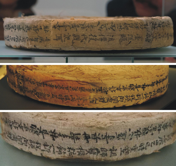 Inscriptions in classical Chinese on the linen scroll where the statue was seated. Photo provided to chinadaily.com.cn