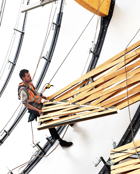 A builder works on the construction of the Chinese pavilion for the upcoming Milan Expo 2015.[Photo provided to China Daily]