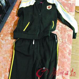 The photo, published on April 25, 2015, shows two pieces included in a uniform set for students at the Gongguan Foreign Language School in Guangdong province that costs 2,180 yuan, or about 352 U.S. dollars. (Photo: Guangzhou Daily)
