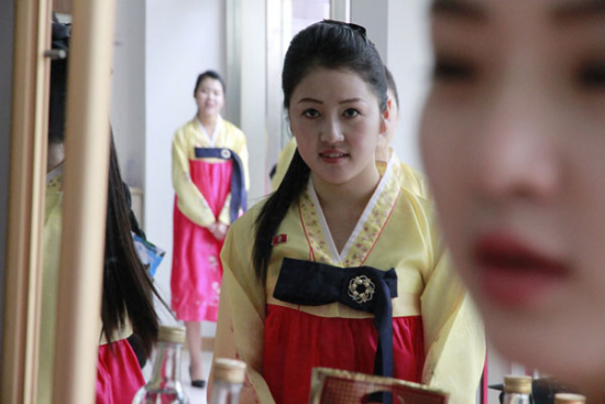 DPRK women attend a cross-border trade fair in Dandong. (Photo/China Daily)