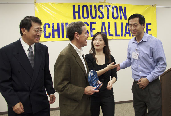 From left: David Cao, Houston Chinese Alliance (HCA) board member; Edward Blum, head of Students for Fair Admissions; Sun Ying, HCA president; and vice-president Howard Xu discuss a lawsuit against Harvard University over its admissions practices in regards to Asian students. May Zhou / China Daily