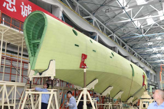 A section of fuselage for China's large amphibious aircraft AG-600 completed and ready for delivery in Hanzhong, Shaanxi province, on Sunday. (Photo/China Daily)