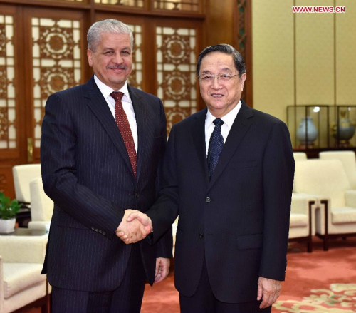 Yu Zhengsheng (R), chairman of the National Committee of the Chinese People's Political Consultative Conference (CPPCC), meets with Algerian Prime Minister Abdelmalek Sellal in Beijing, capital of China, April 28, 2015. (Xinhua/Li Tao)