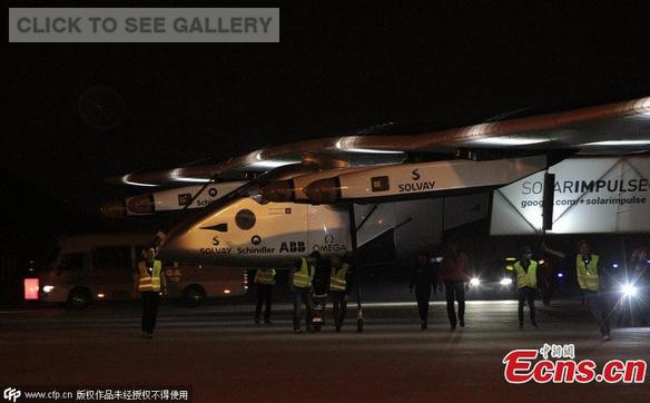 The Solar Impulse 2, the world's largest solar-powered aircraft touches down in Southwest China's Chongqing municipality in the morning of Tuesday, March 31. It had left Mandalay in Myanmar some 20 hours previously. (Photo/CFP)