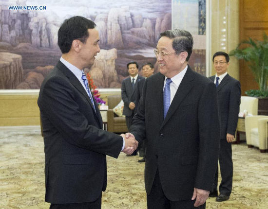 Yu Zhengsheng (R), a member of the Standing Committee of the Political Bureau of the Communist Party of China (CPC) Central Committee and chairman of the National Committee of the Chinese People's Political Consultative Conference (CPPCC), meets with Eric Chu, chairman of the Kuomintang (KMT), before the 10th Cross-Strait Economic, Trade and Culture Forum in Shanghai, east China, May 2, 2015. (Xinhua/Wang Ye)